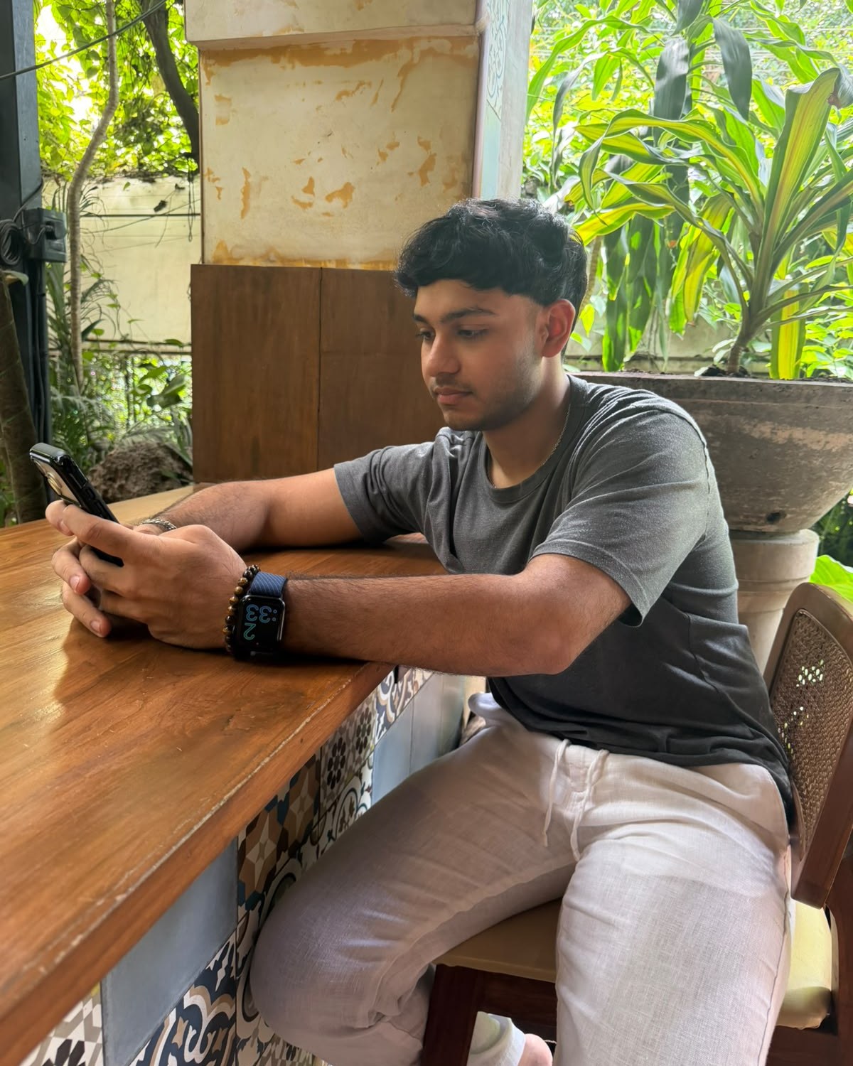 Ahaan Singhania, founder of Cove Craft Studios, at a café counter in Goa